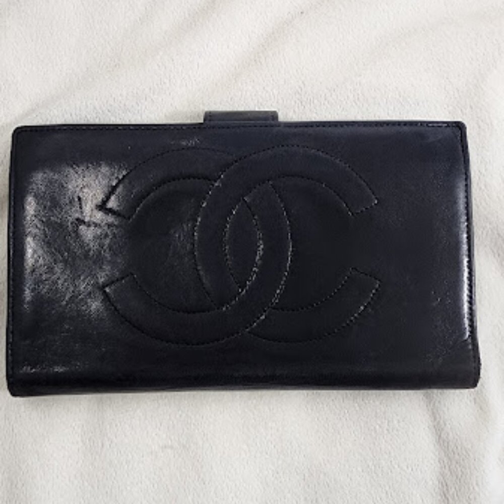Chanel 1991-1994 Long Wallet. Lambskin. Black. Interior is clean.